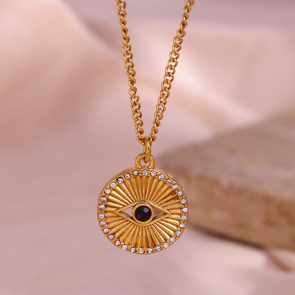 Minimalist Black Eye Pendant Necklace in Stainless Steel with 18K Gold Plating and Rhinestone Inlay, Sunburst Coin Shape