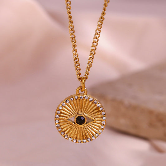 Collar con colgante de ojo negro minimalista de acero inoxidable con baño de oro de 18 quilates e incrustaciones de diamantes de imitación, forma de moneda con rayos de sol