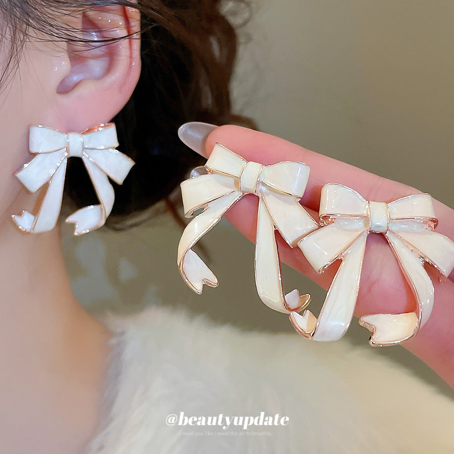 Pendientes Elegantes de Nudo de Lazo en Aleación con Acabado Esmaltado para Mujer, Estilo Lujo Minimalista
