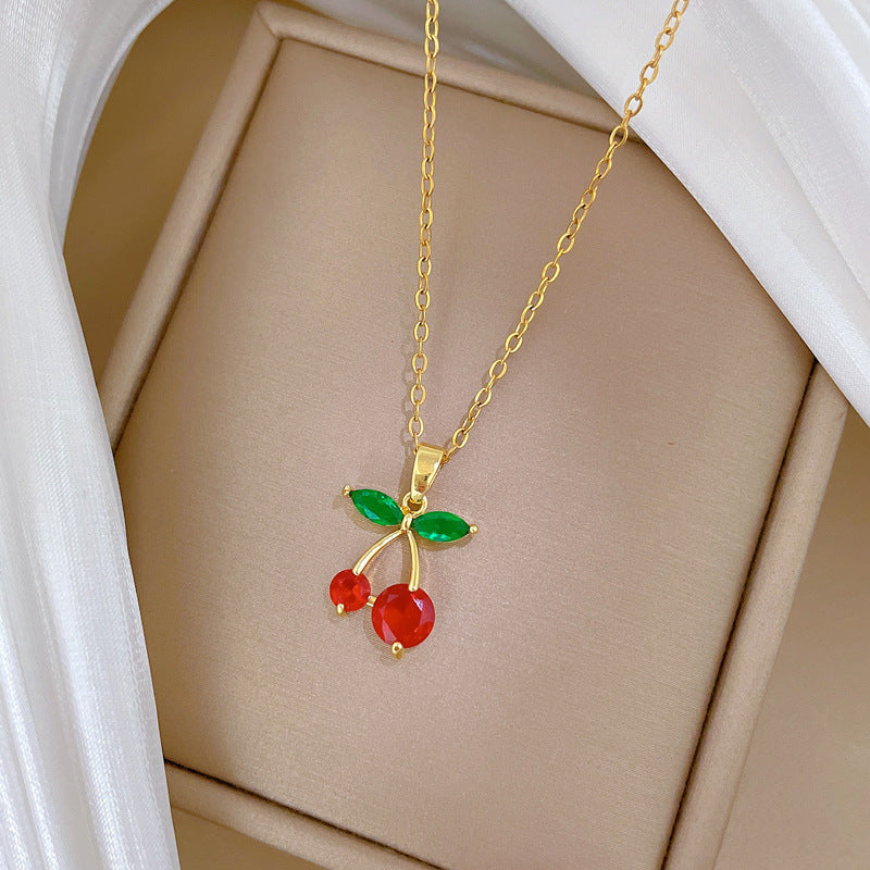 Collar con colgante de cereza de dibujos animados para mujer, de acero inoxidable con incrustaciones de diamantes de imitación y delicada cadena de clavícula