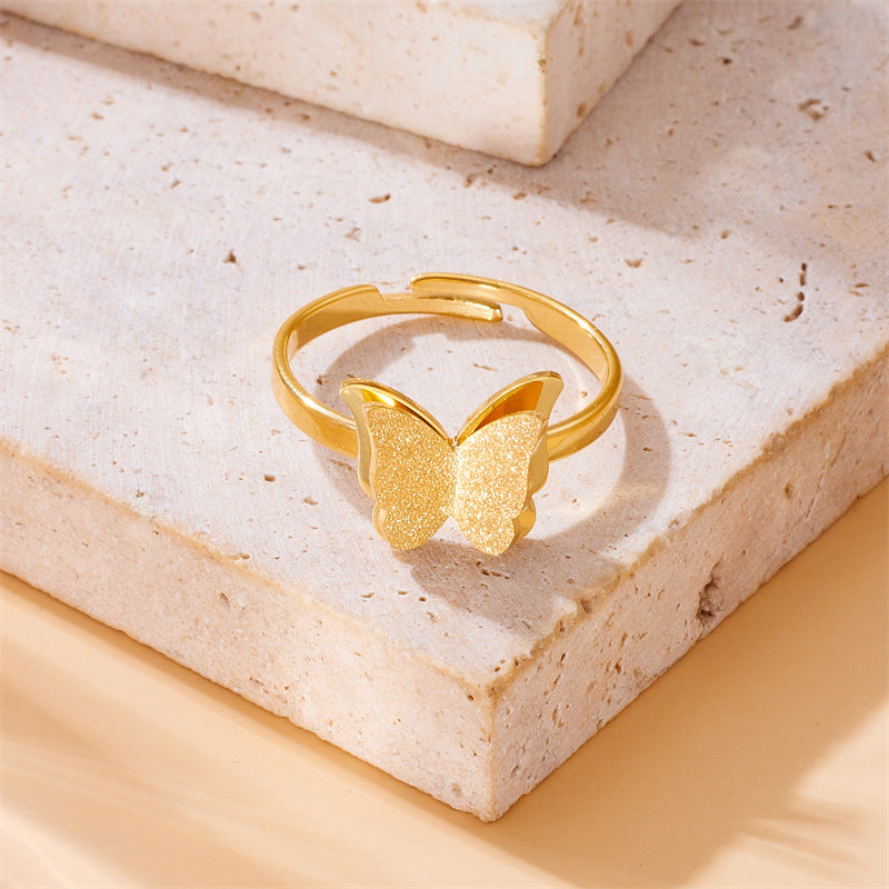 Anillo minimalista de mariposa ajustable de acero inoxidable con baño de oro para mujer