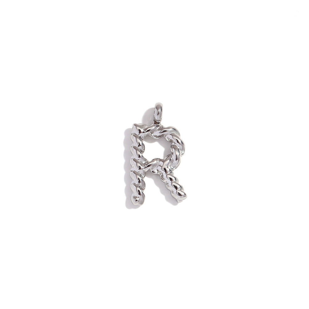 Colgante minimalista de acero inoxidable chapado en oro de 18 quilates con mini letra retorcida para mujer
