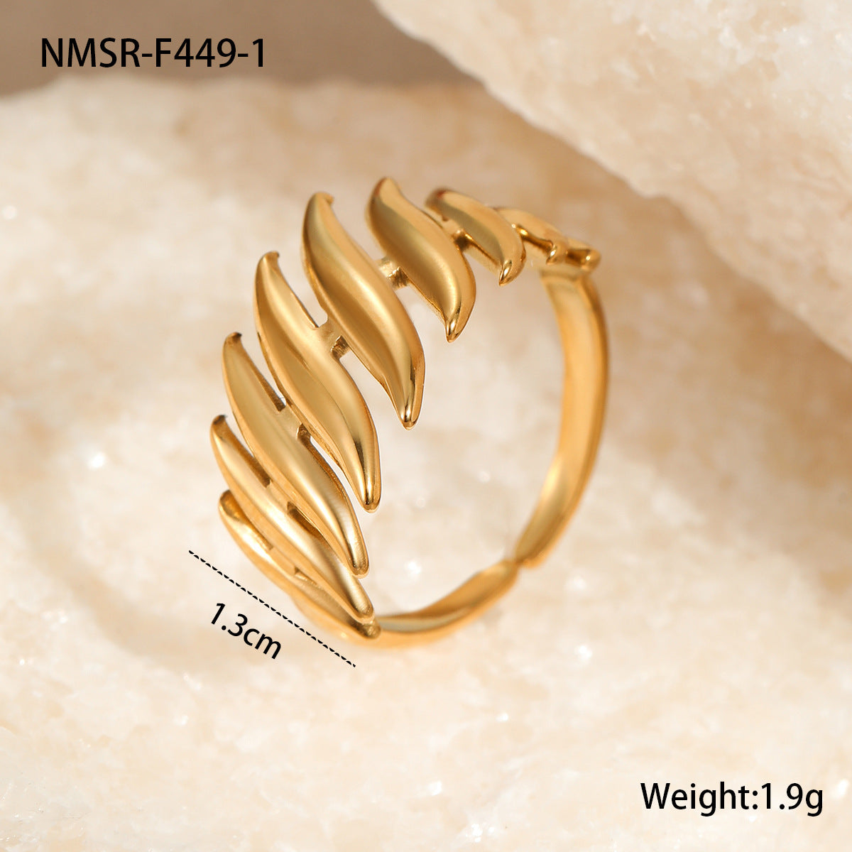 Anillo minimalista de acero de titanio con forma de hoja y chapado en oro de 18 quilates para mujer