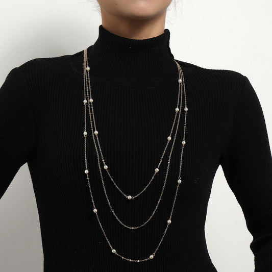 Lunga collana a strati elegante in stile perla da donna con ciondolo geometrico