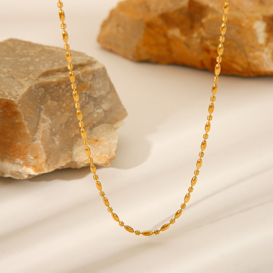 Collana da donna a clavicola in acciaio al titanio placcato oro 18 carati con perline ovali in stile Ins minimalista