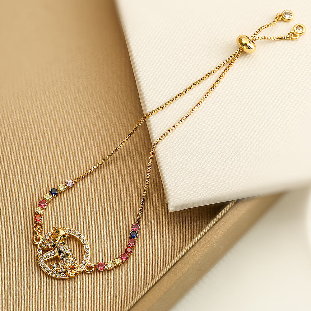 Minimalist Geometric Evil Eye Adjustable Bracelet for Women with Brass Base and Gold Plating Featuring Micro-Pave Leopard Charm