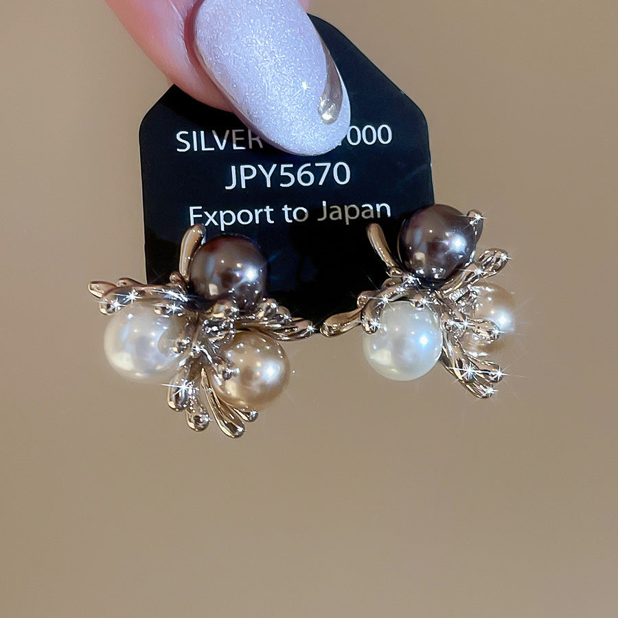Orecchini da donna vintage eleganti a forma di stella geometrica con perle simulate e zirconi, perni in acciaio placcato