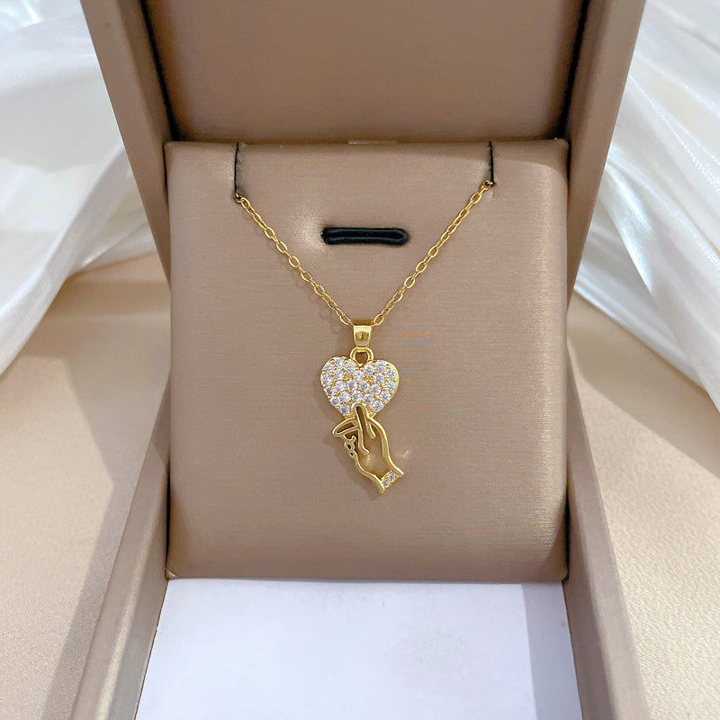 Collar minimalista de acero de titanio con forma de corazón coreano y circonitas incrustadas para mujer y hombre, cadena delicada para la clavícula