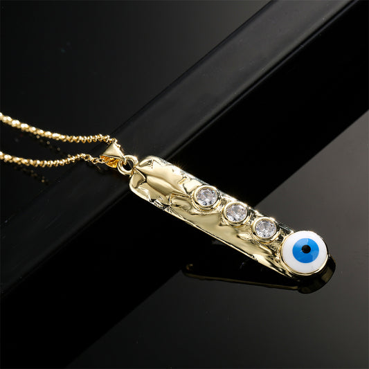 Collar con colgante de barra vertical geométrica con base de cobre y chapado en oro real, diseño de ojo turco esmaltado