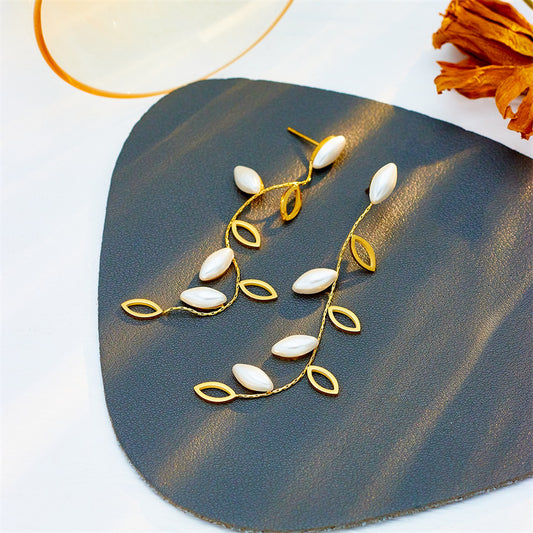 Minimalist Elegant Pearl-Embellished Hollow Leaf Dangle Stud Earrings in Titanium Steel with Plated Finish
