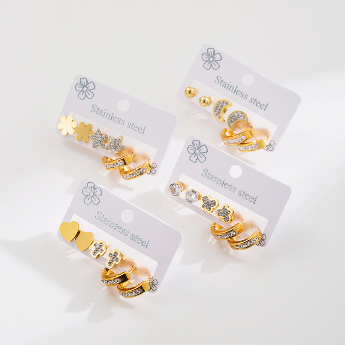 Eleganti orecchini geometrici a forma di stella in acciaio inossidabile con intarsi di strass e placcatura in oro da donna