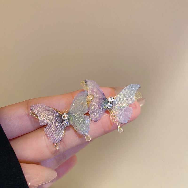 Orecchini floreali delicati con perni in argento, borchie in rame elettrolitico con nappe fluenti, estetica fresca e dolce per donna
