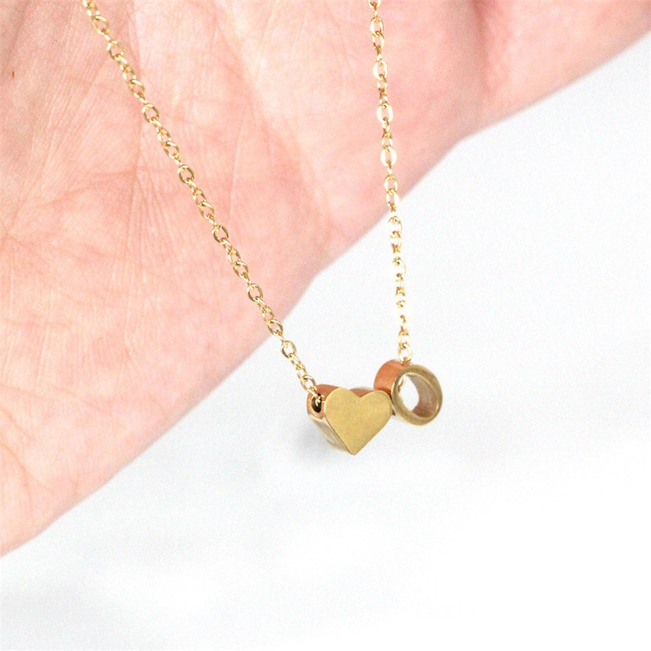 Collana Minimalista con Ciondolo a Cuore in Acciaio Inossidabile, Charms in Acciaio al Titanio e Finitura Placcata per Uomo e Donna