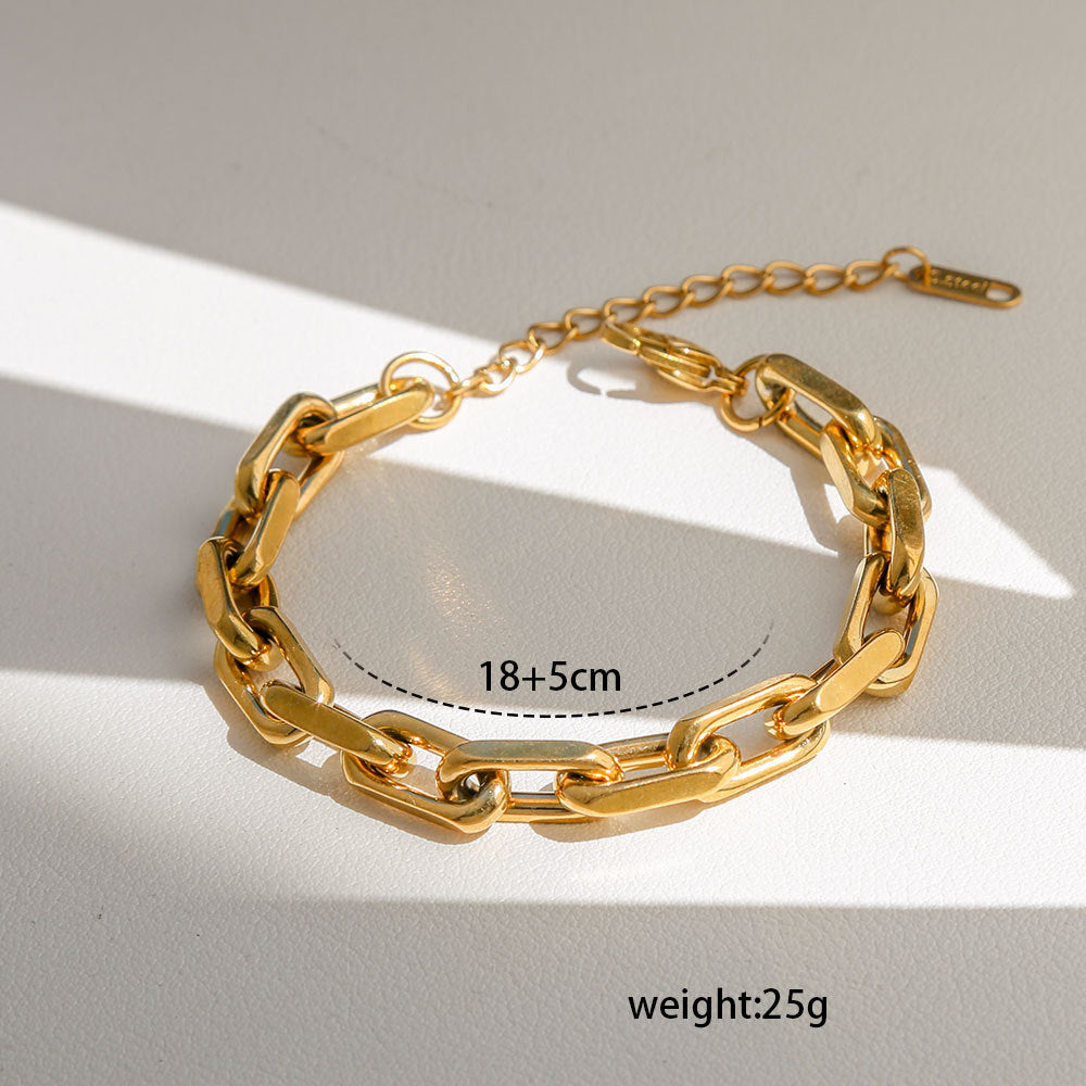 Pulsera unisex de acero inoxidable chapada en oro con diseño atrevido, estilo urbano y estética hip-hop
