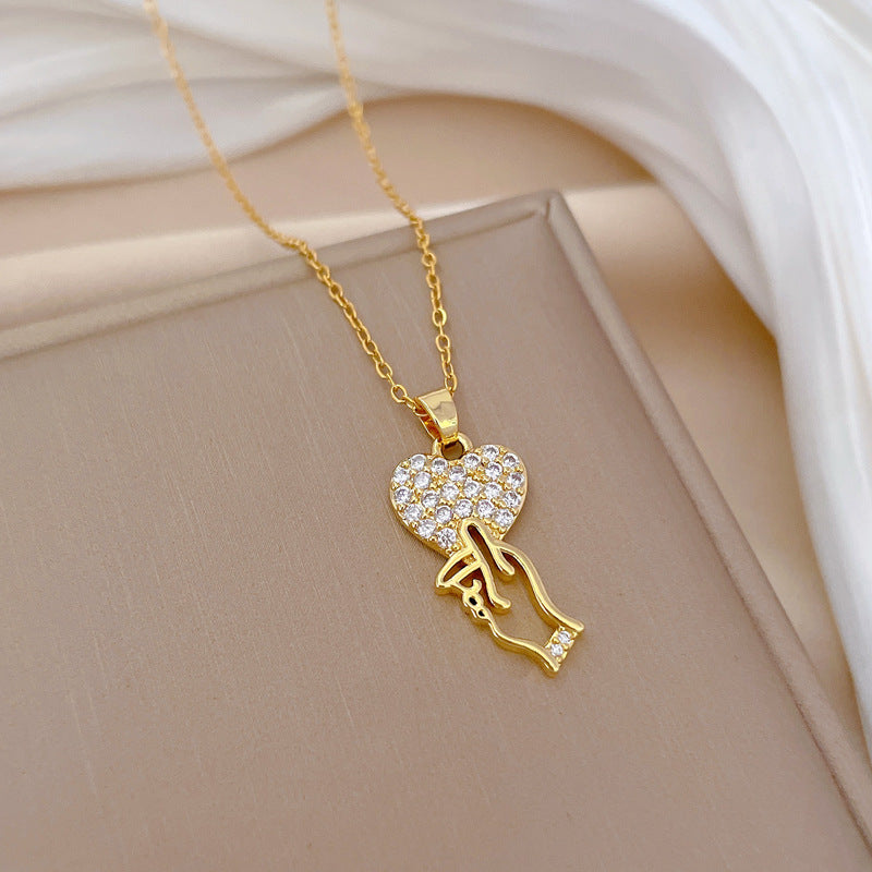 Collar minimalista de acero de titanio con forma de corazón coreano y circonitas incrustadas para mujer y hombre, cadena delicada para la clavícula