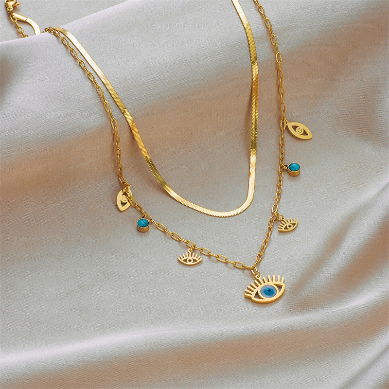 Collana con Pendente Occhio Turco Etnico Minimalista Vintage in Acciaio al Titanio con Finitura Placcata e Catena a Serpente