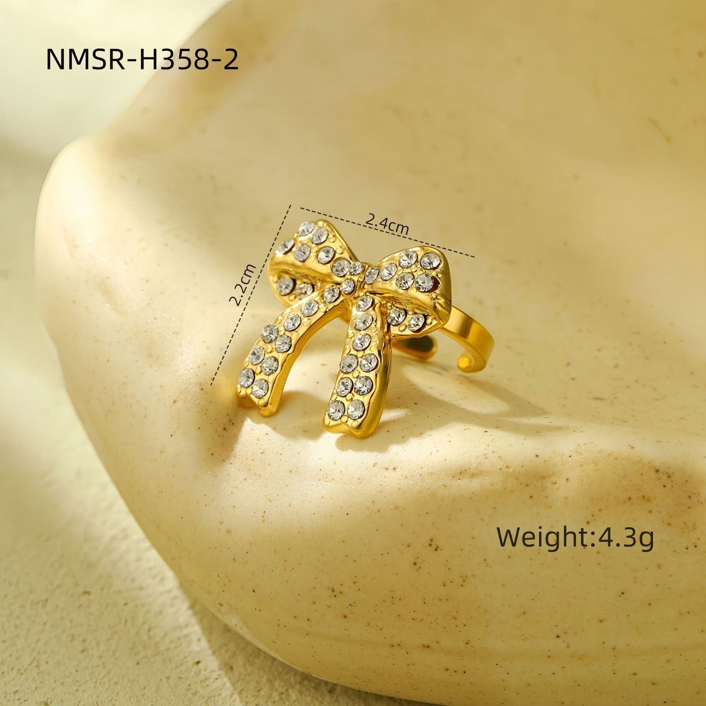 Orecchini di lusso da donna in acciaio al titanio a forma di fiocco con intarsio di strass completo e finitura placcata