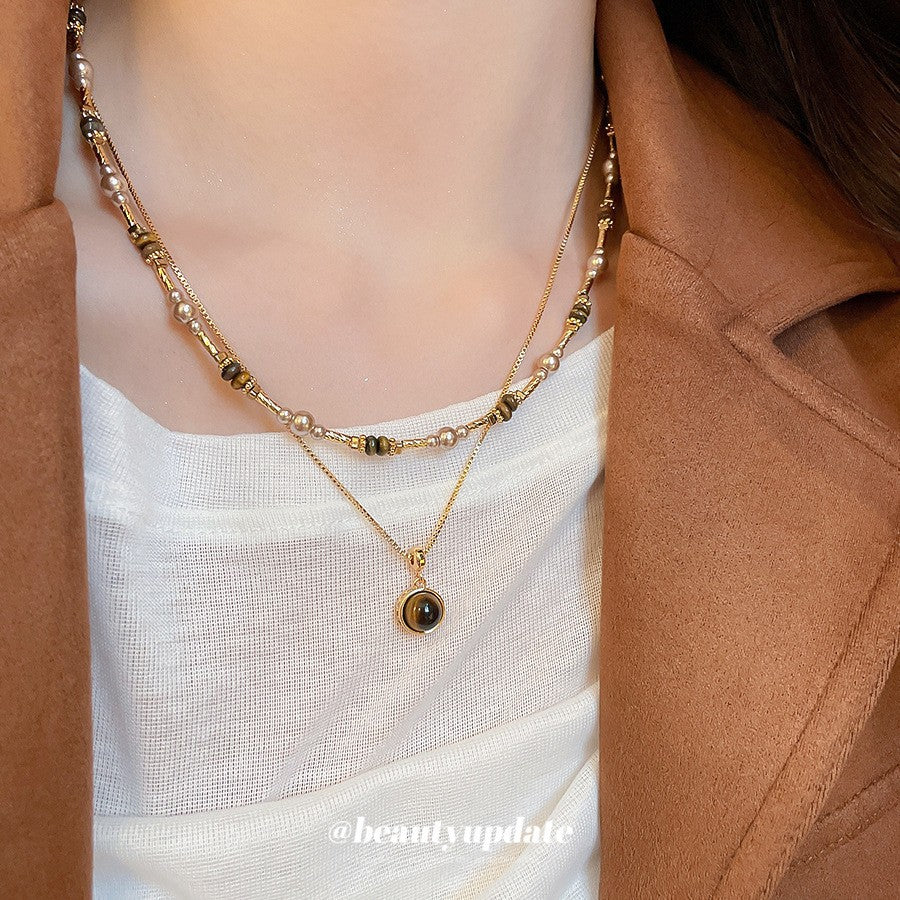 Collana pendente occhio di tigre in stile retrò con design geometrico da donna, catena a maglie color oro, accessorio minimalista di lusso