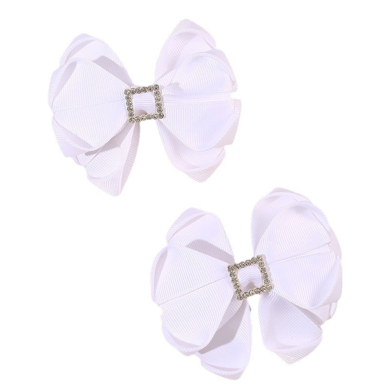Deliziosa molletta per capelli a fiocco minimalista per bambini in tulle con texture arricciata e a rete