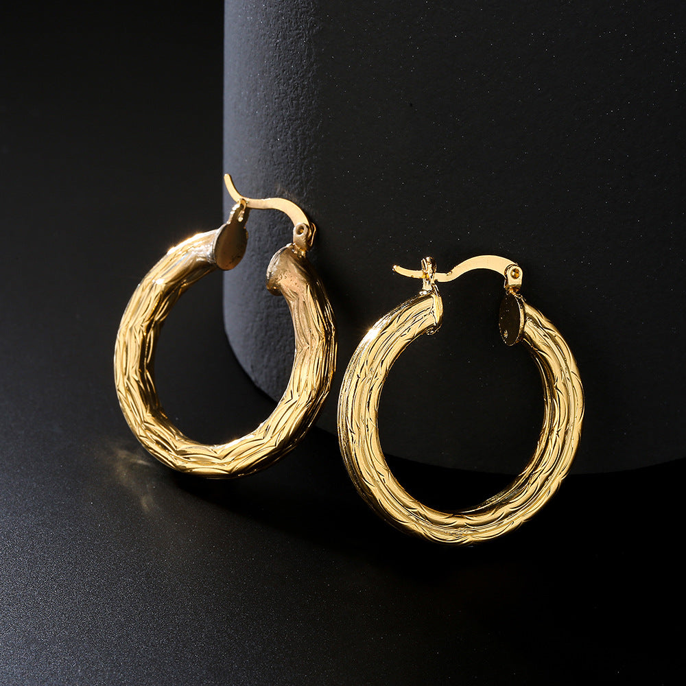 Aretes Redondos Geométricos en Cobre con Baño de Oro de 18K y Incrustación de Zircón para Mujer