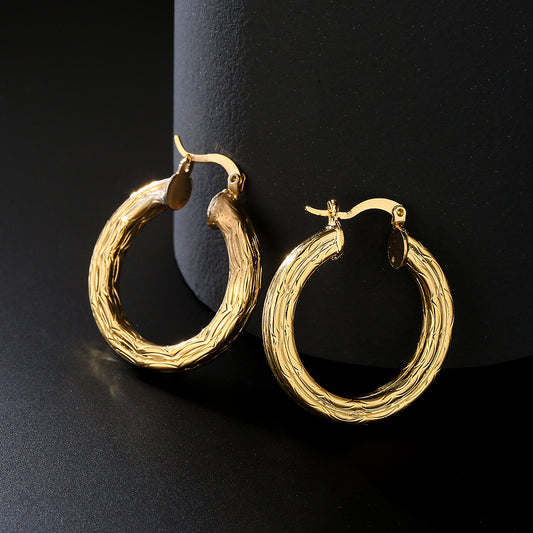 Aretes Redondos Geométricos en Cobre con Baño de Oro de 18K y Incrustación de Zircón para Mujer