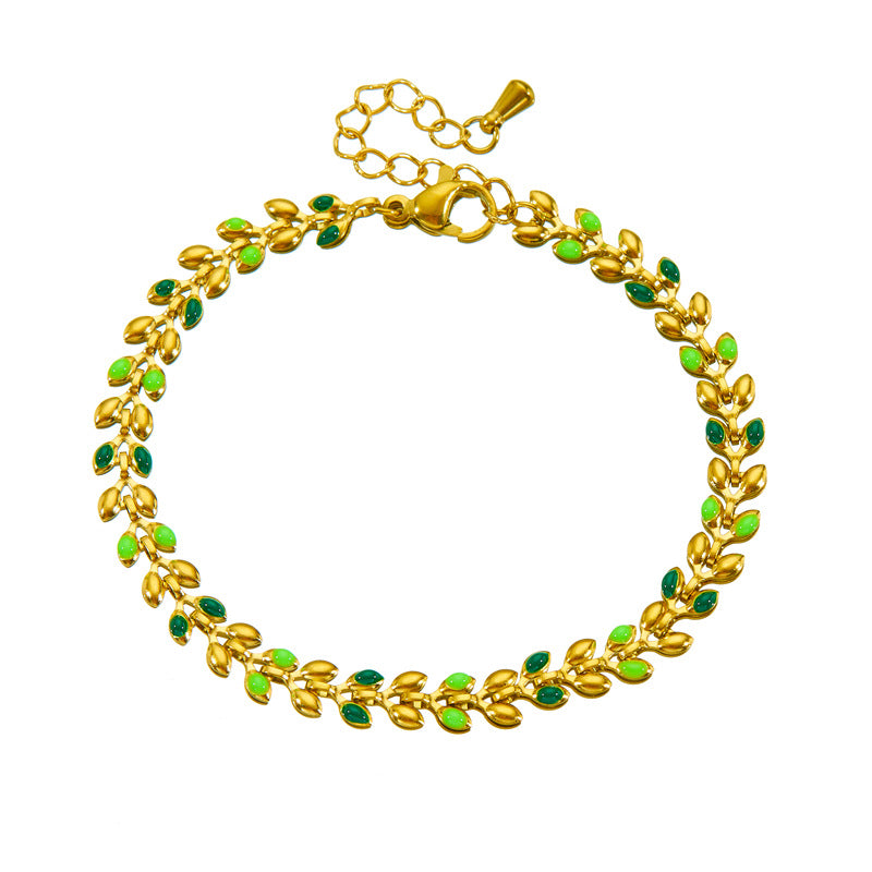 Bracciale da donna placcato oro minimalista in acciaio inossidabile con charm a foglia