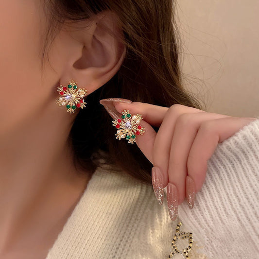 Orecchini a perno con fiocco di neve natalizio in lega geometrica alla moda per donna con finitura placcata