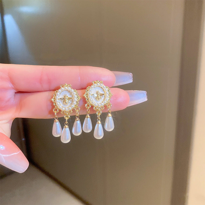 Orecchini a perno vintage in lega a forma di goccia con intarsio in strass e perni in acciaio inossidabile da donna