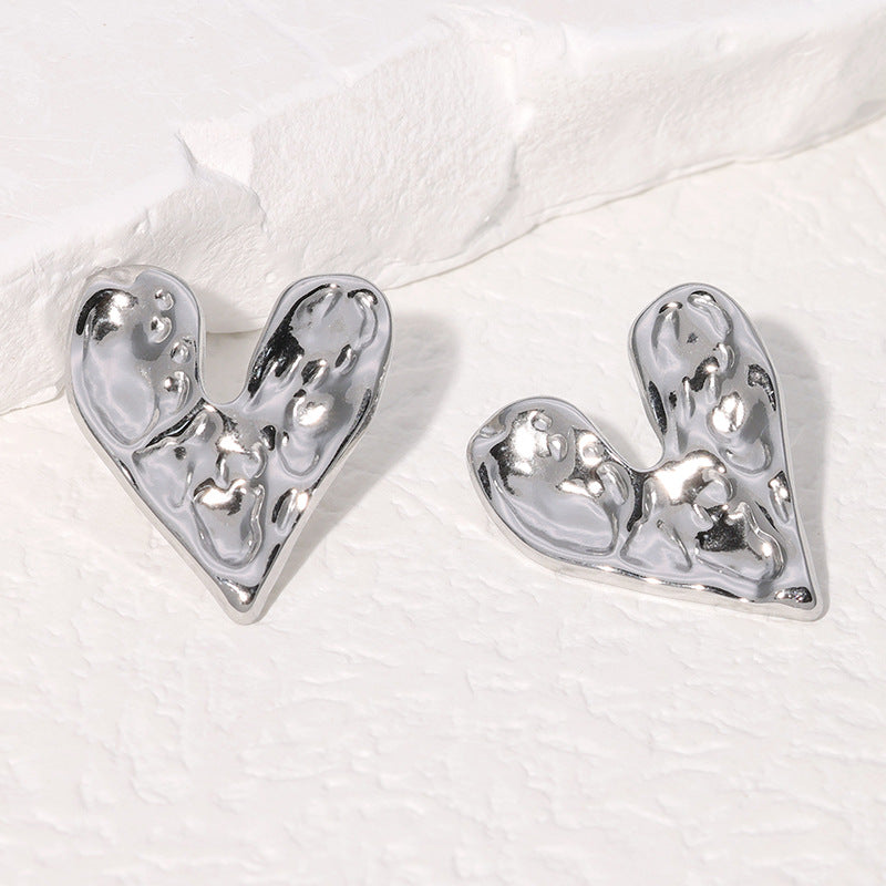 Orecchini a perno minimalisti a forma di cuore in acciaio inossidabile con finitura placcata da donna