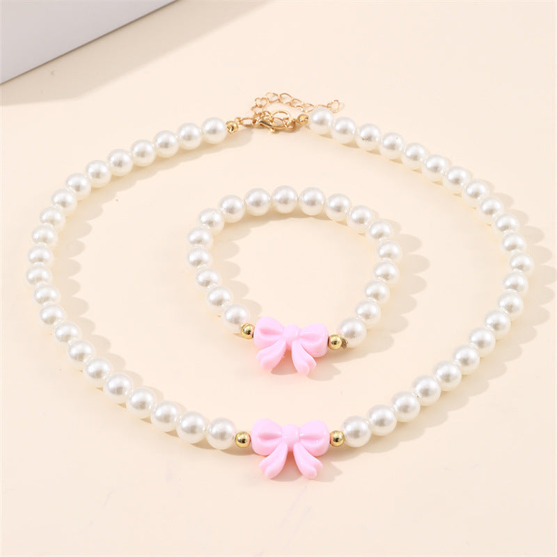 Set collana in lega a forma di fiocco stile principessa per ragazze con catena di perline rotonde e finitura artigianale