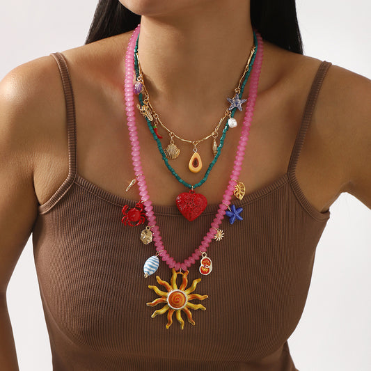 Collar de mujer estilo bohemio con cuentas en forma de corazón y estrella de mar, con esmalte y colgante de aleación en cadena estándar