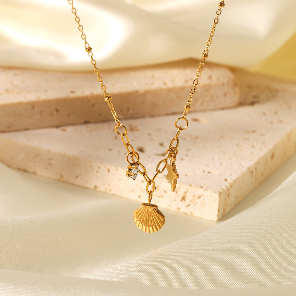 Minimalist Starfish and Seashell Pendant Necklace in Stainless Steel with Rhinestone Inlay, Titanium Steel Locket Chain, Ocean-Inspired Geometric Design for Women