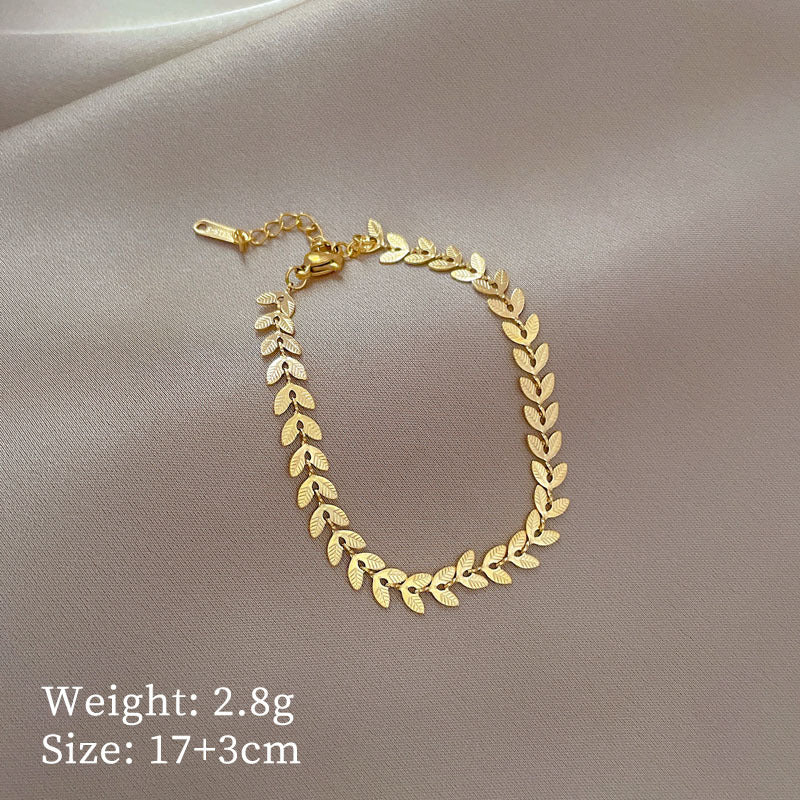 Vintage Women's Titanium Steel Rope Chain with Round Beads and Roman Numerals Gold Plated Wave Texture Four-Season Bean Hand Chain