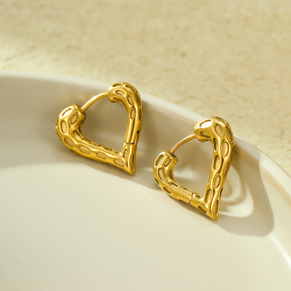 Vintage Style Hollow Heart-Shaped Titanium Steel Earrings with Plated Finish for Women