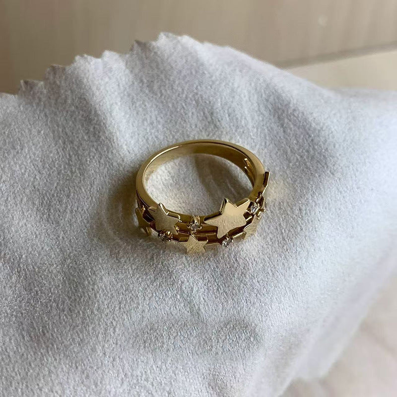 Anillo abierto de lujo francés retro con forma de estrella para mujer con incrustaciones de circonita cúbica en cobre