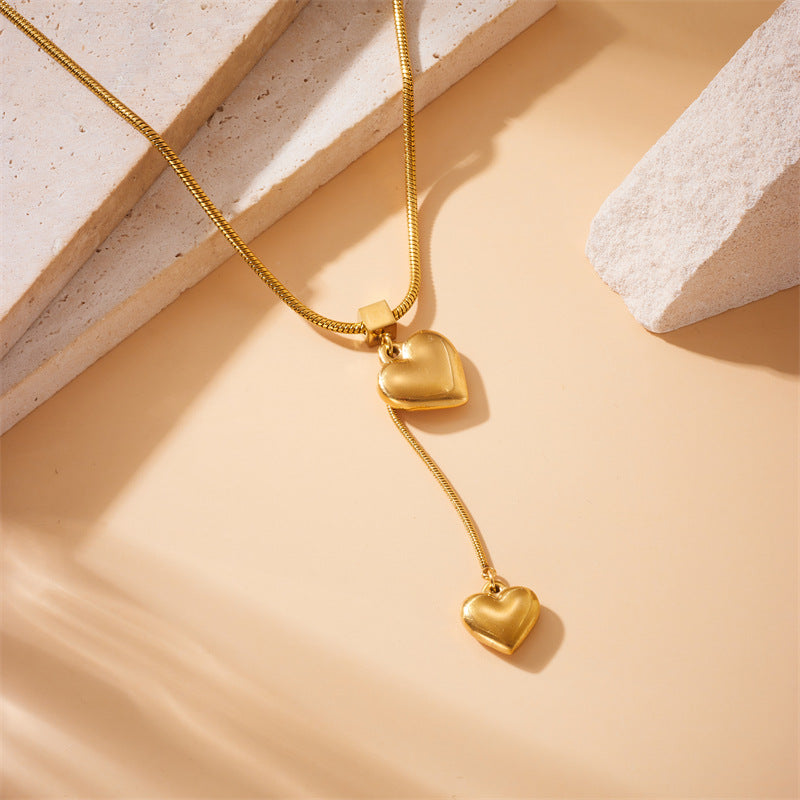 Collana con ciondolo a cuore placcato in acciaio inossidabile, elegante e minimalista, con catena a scatola
