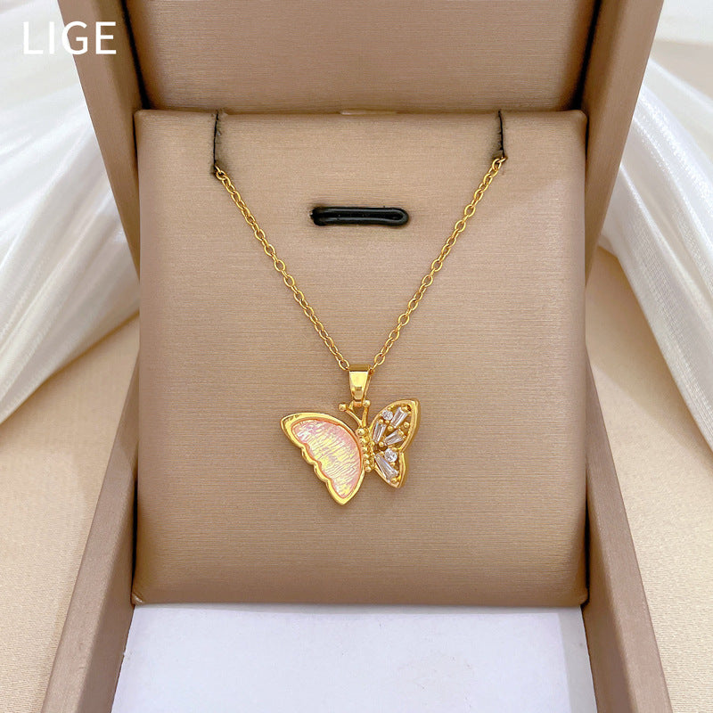 Set di collana e orecchini a farfalla geometrici da donna in acciaio al titanio di lusso con strass