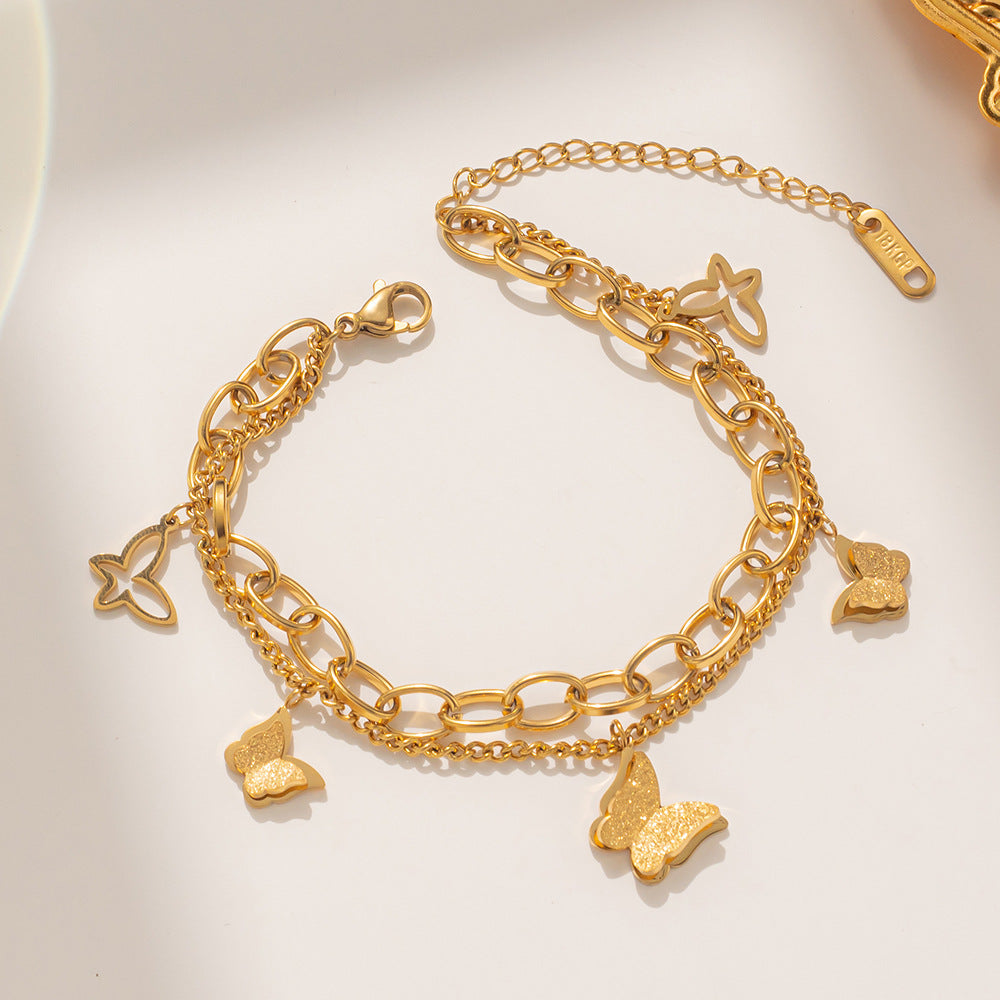 Bracciale a doppia farfalla in acciaio al titanio placcato oro rosa da donna con design geometrico e stile minimalista alla moda