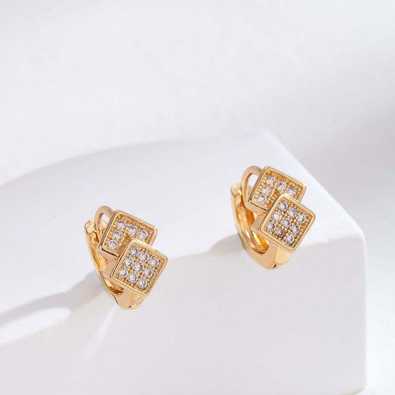Pendientes minimalistas de corazón y estrella geométricos en cobre con postes de plata S925 e incrustaciones de circonita cúbica