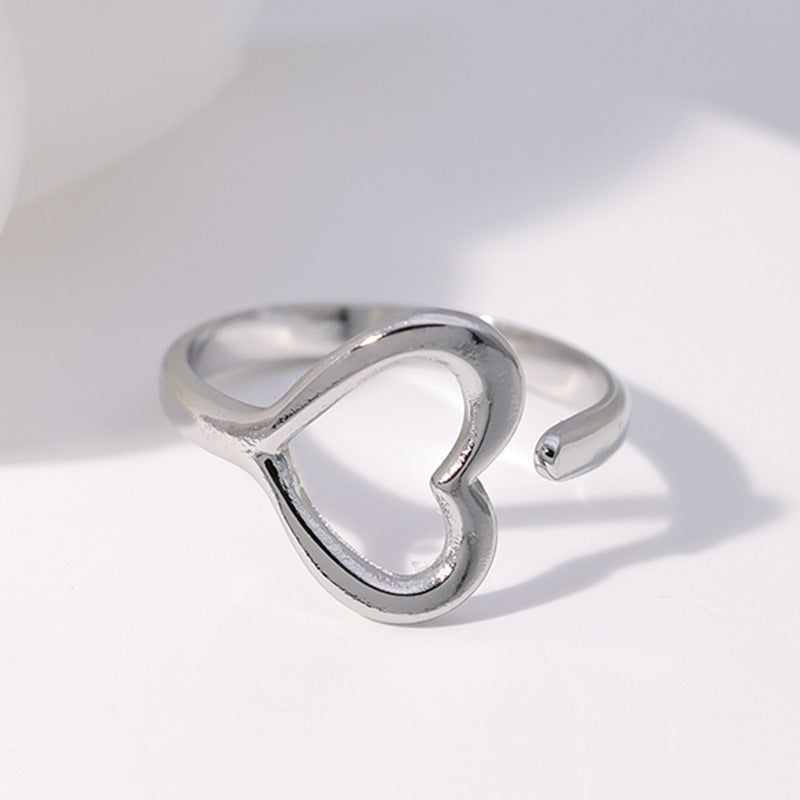 Anello regolabile dolce e minimalista a forma di cuore in acciaio inossidabile con finitura placcata per donna