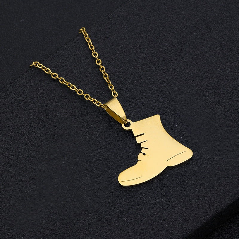 Elegante collar unisex con colgante geométrico de baloncesto, raqueta de tenis y diente en acero inoxidable con detalles de acero de titanio y acabado galvanizado