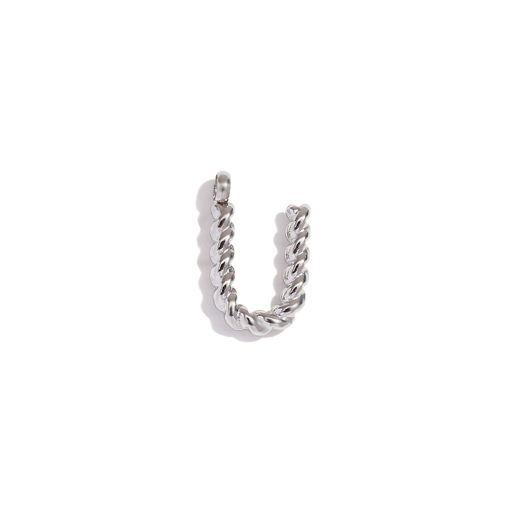 Colgante minimalista de acero inoxidable chapado en oro de 18 quilates con mini letra retorcida para mujer