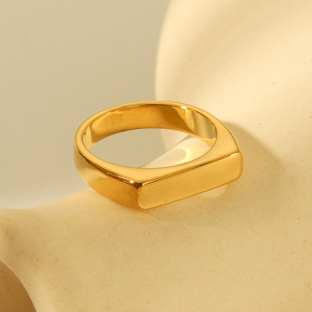 Anillo minimalista geométrico plano de acero titanio para mujer con baño de oro de 18K