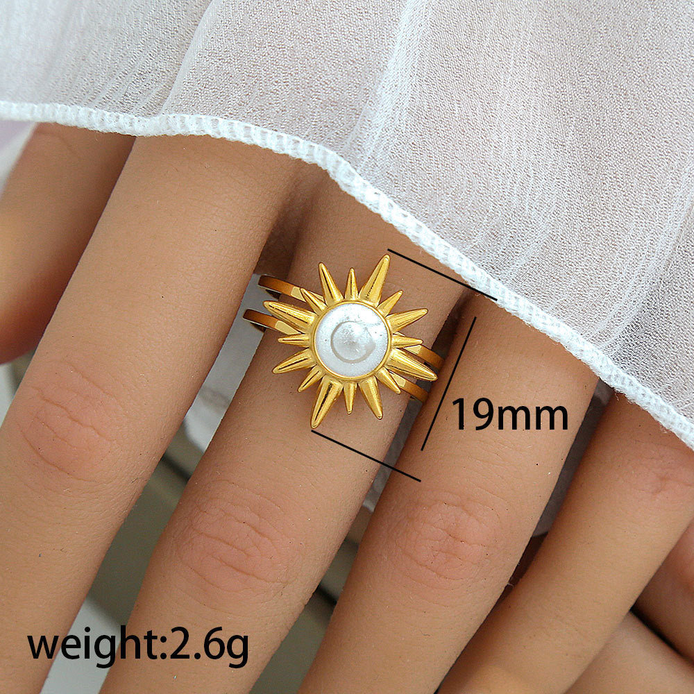 Anillo minimalista de acero de titanio con forma de girasol para mujer, con banda abierta ajustable y acabado chapado en oro