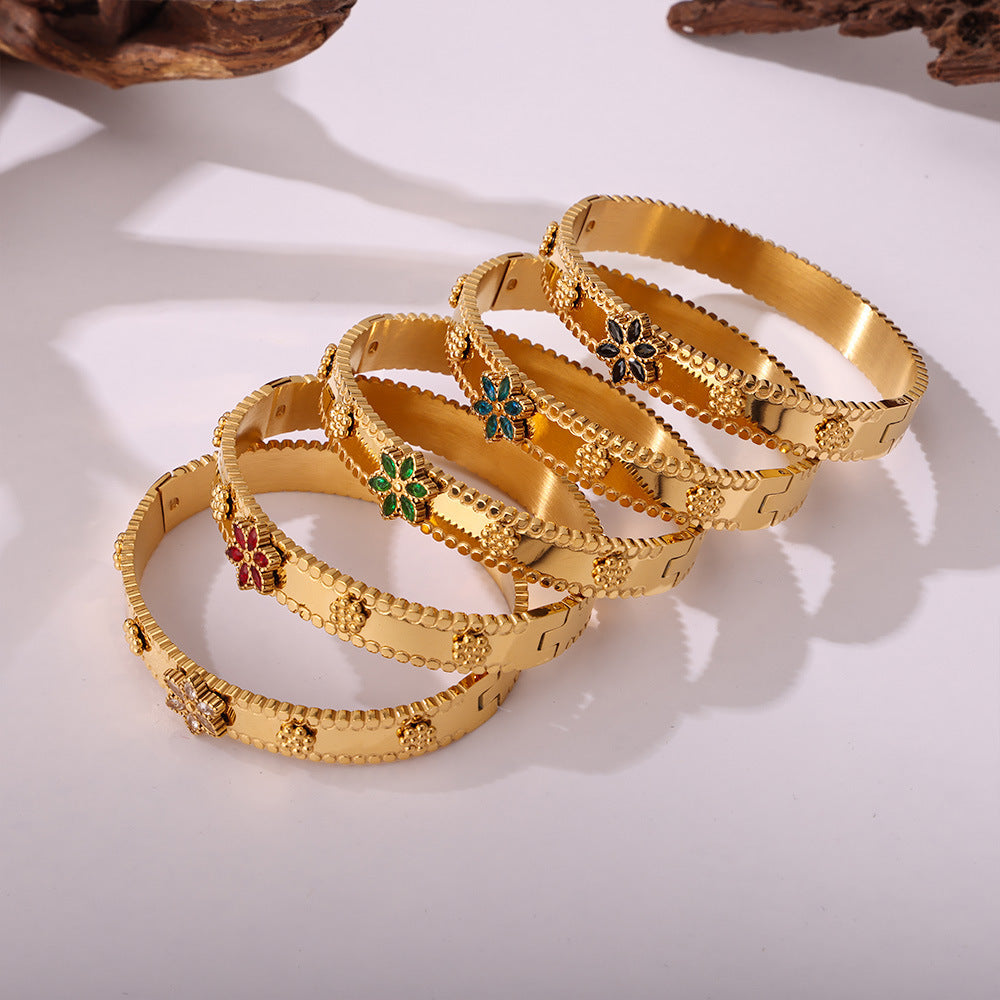 Pulsera de acero inoxidable con forma de copo de nieve y rueda de la fortuna, con incrustaciones de circonita y chapado en oro de 18 quilates.