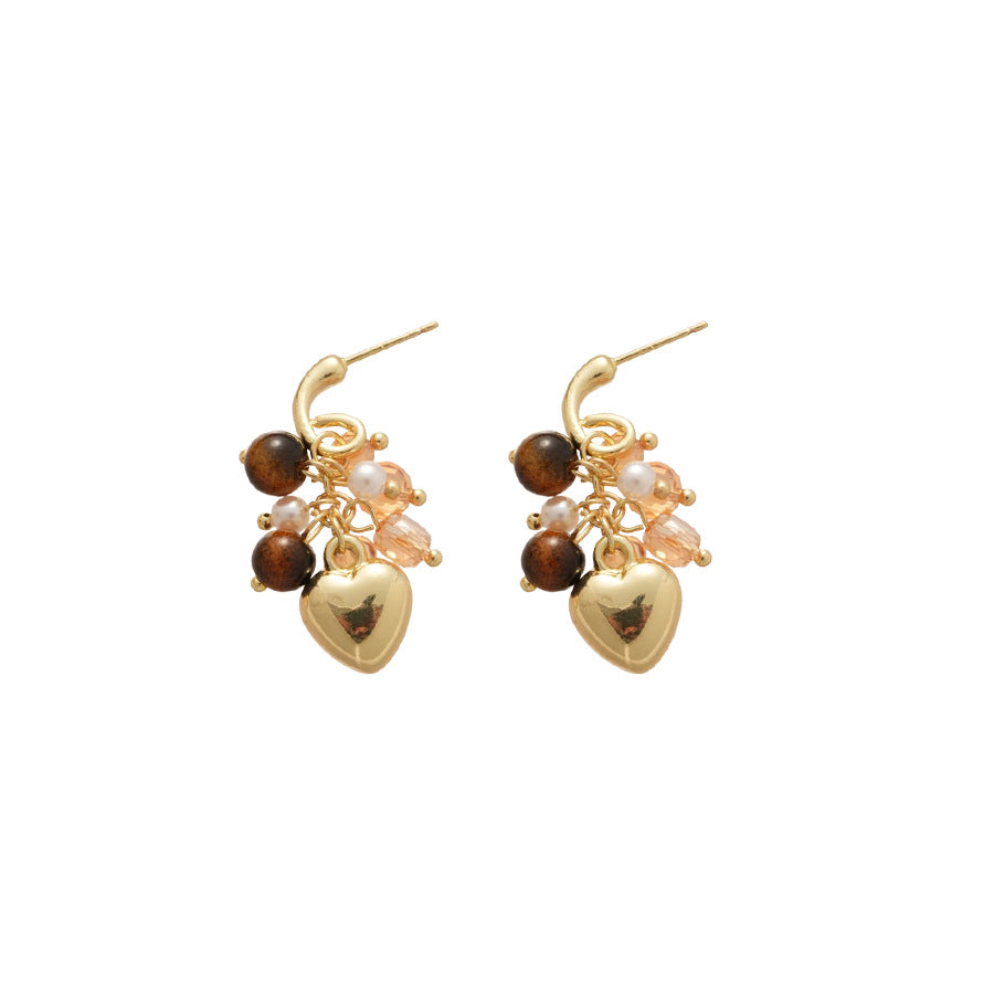Orecchini a perno da donna chic a nappa con cuore geometrico occhio di tigre e intarsio di strass