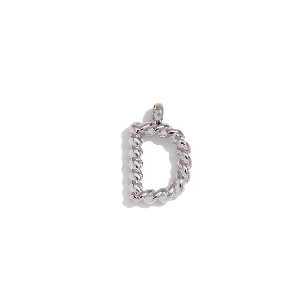Colgante minimalista de acero inoxidable chapado en oro de 18 quilates con mini letra retorcida para mujer