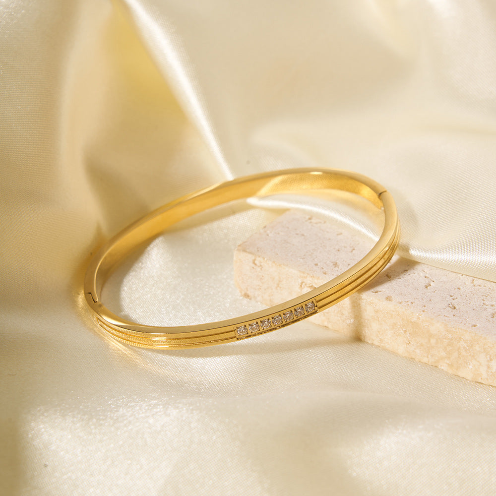 Bracciale Minimalista Lusso in Acciaio Inossidabile Placcato Oro 18K con Design Geometrico Monofila di Zirconi per Donna