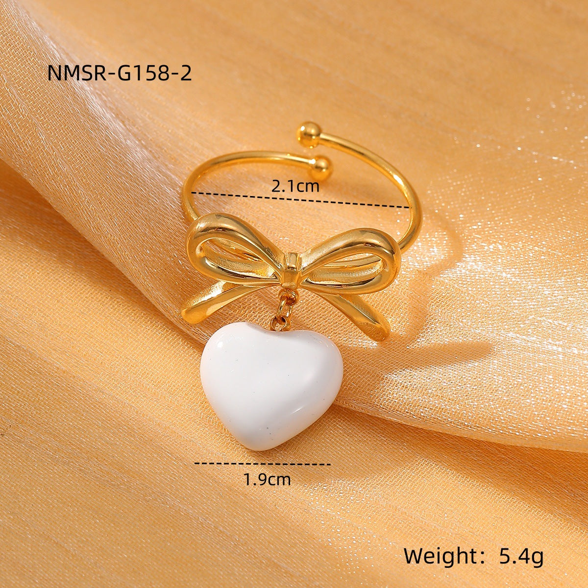 Anillo de acero de titanio de lujo minimalista en forma de corazón y lazo para mujer con acabado esmaltado y superficie chapada