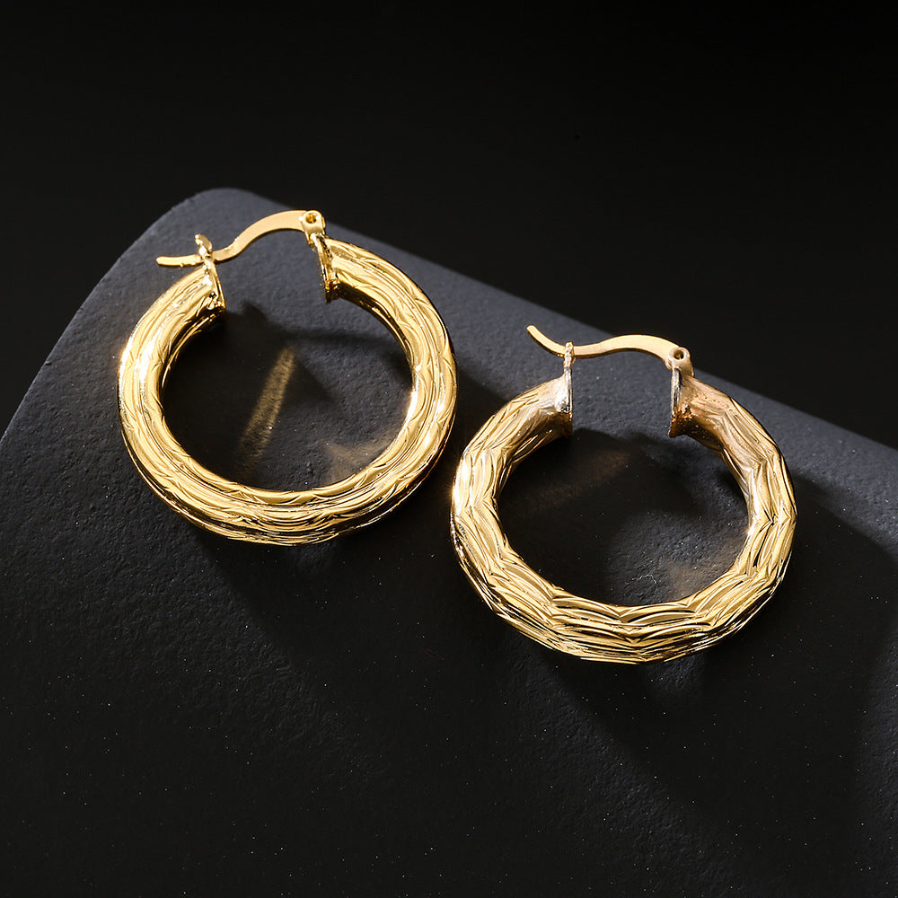 Aretes Redondos Geométricos en Cobre con Baño de Oro de 18K y Incrustación de Zircón para Mujer